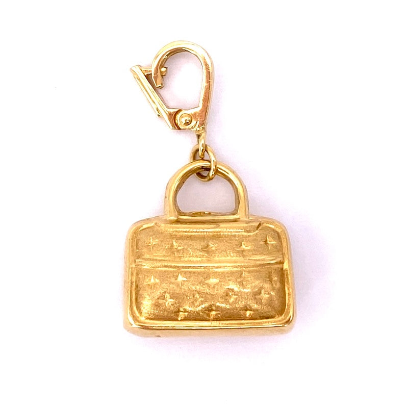 Ciondolo charm borsetta oro giallo 18 kt; 3.83 gr
