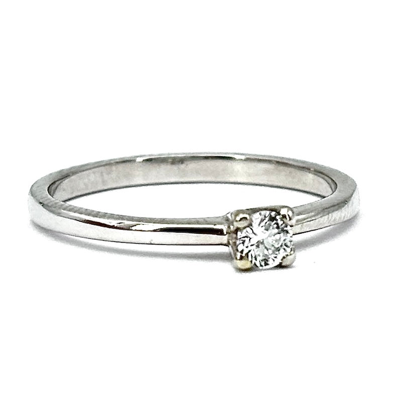 Anello brillante solitario 0.15 ct e oro bianco; 2.32 gr