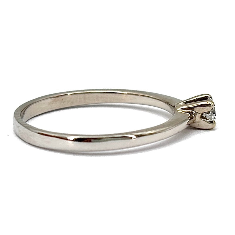 Anello brillante solitario 0.15 ct e oro bianco; 2.32 gr