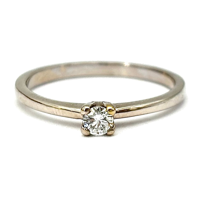 Anello brillante solitario 0.15 ct e oro bianco; 2.32 gr