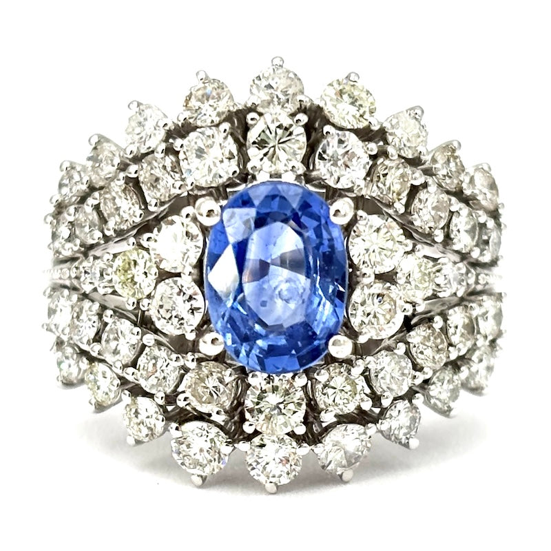 Anello capolavoro fascia zaffiro e tripudio di brillanti, oro bianco;  8.34 gr