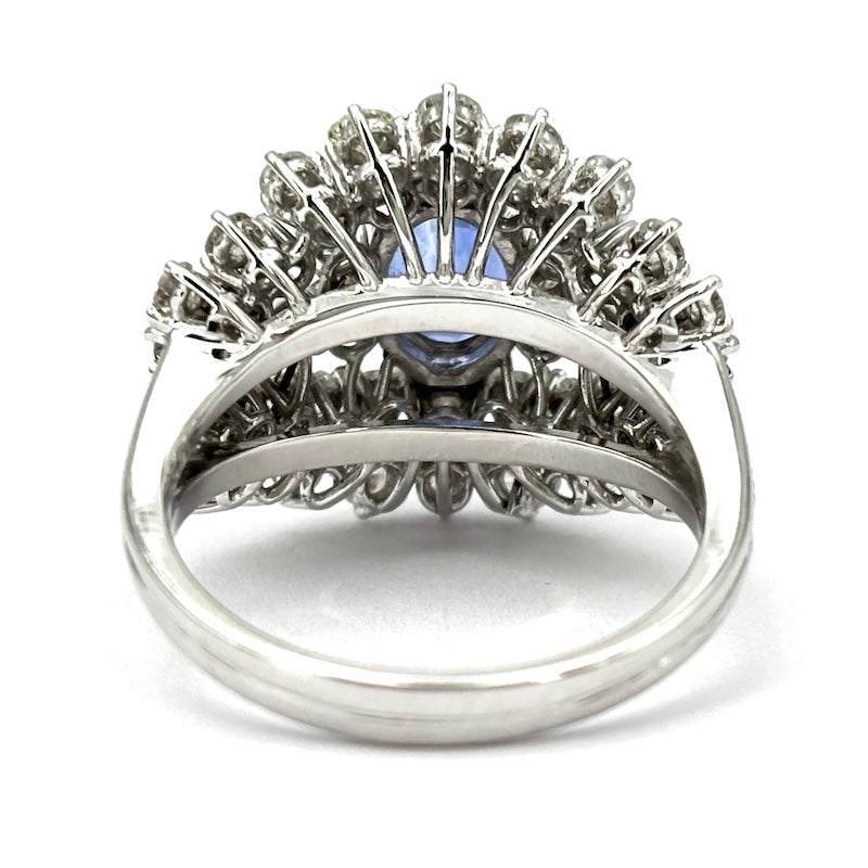 Anello capolavoro fascia zaffiro e tripudio di brillanti, oro bianco;  8.34 gr