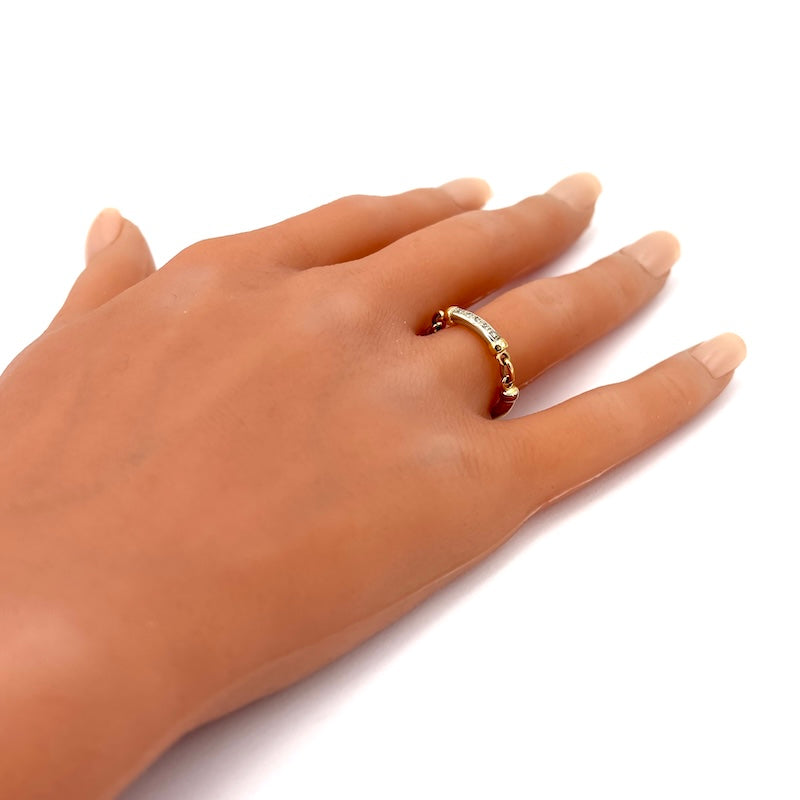 Anello catena mobile cilidri, oro bicolore e brillanti; 4.53 gr