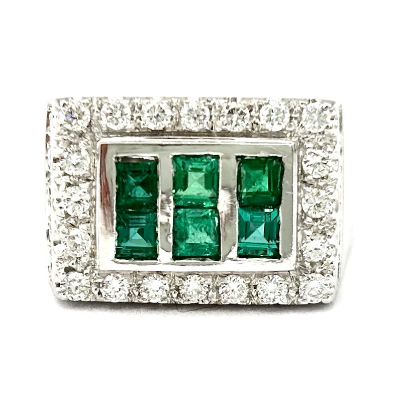 Anello fascia/ponte smeraldi e rettangolo brillanti, oro bianco; 9.13 gr