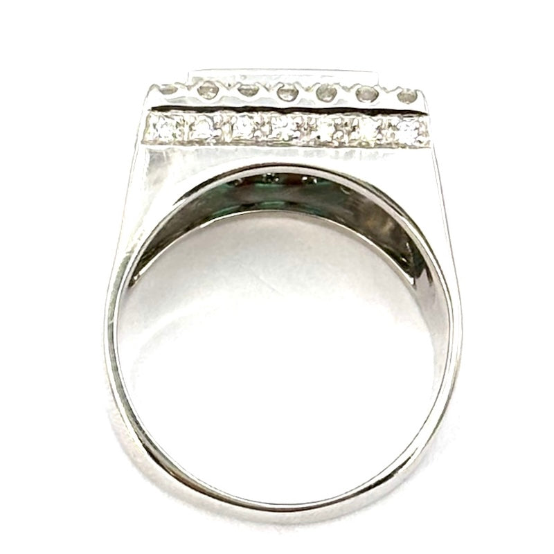 Anello fascia/ponte smeraldi e rettangolo brillanti, oro bianco; 9.13 gr