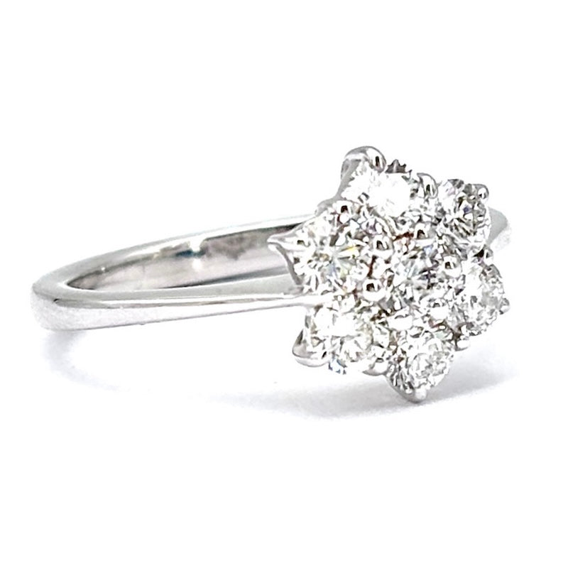 Anello fiore oro bianco e brillanti; 0.98 ct ; 3.83 gr