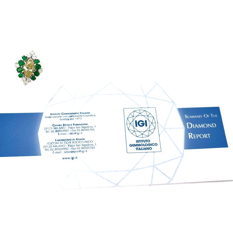 Anello spola CAPOLAVORO, marquise di diamante fancy 3.43 ct, brillanti e smeraldi; 7.41 gr