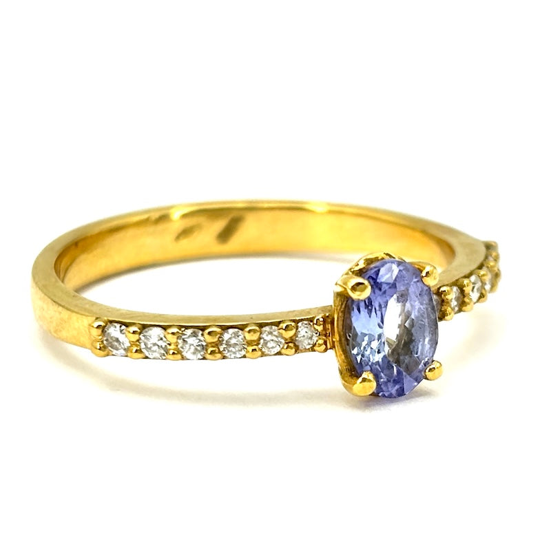 Anello tanzanite e riviera brillanti, oro giallo; 4.65 gr