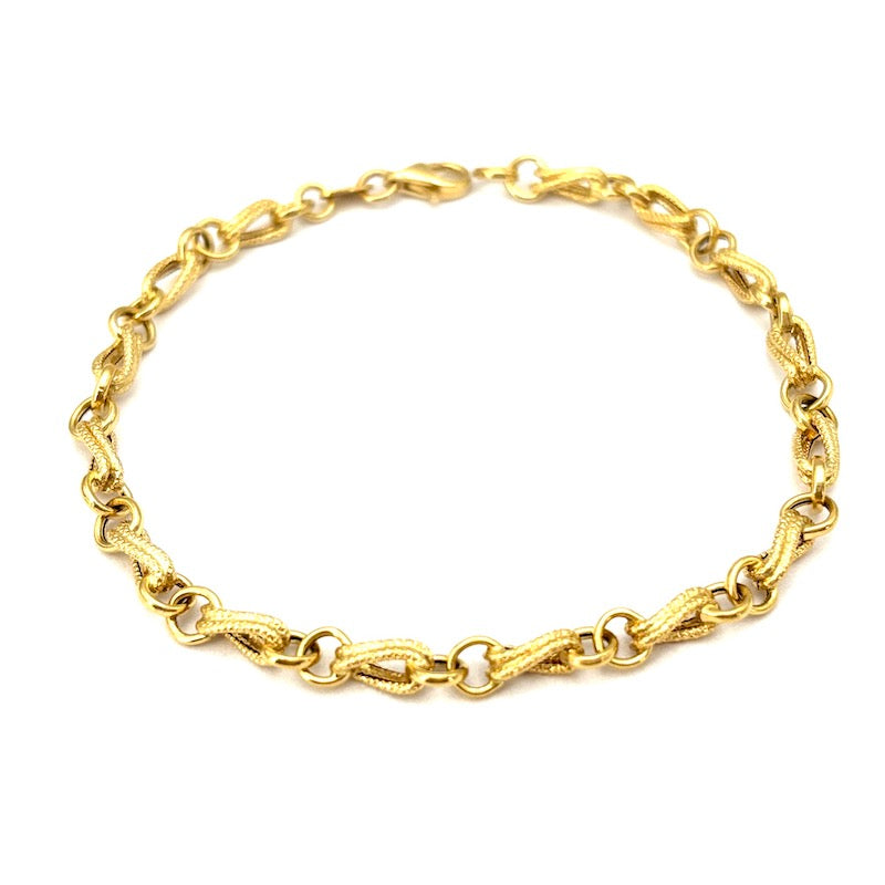 Bracciale catena e motivo retrò oro; 4.88 gr - 19.5 cm