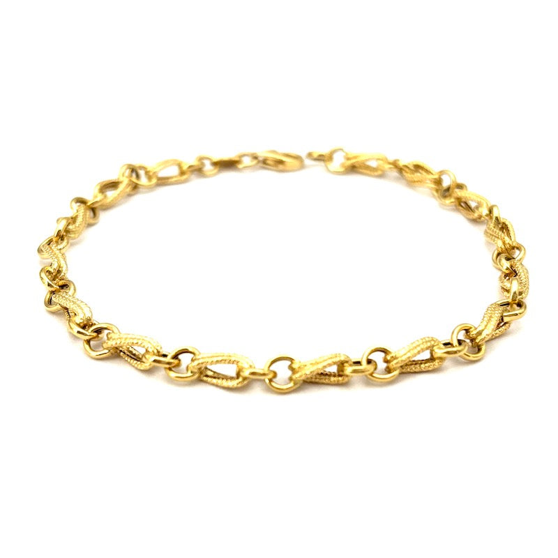 Bracciale catena e motivo retrò oro; 4.88 gr - 19.5 cm