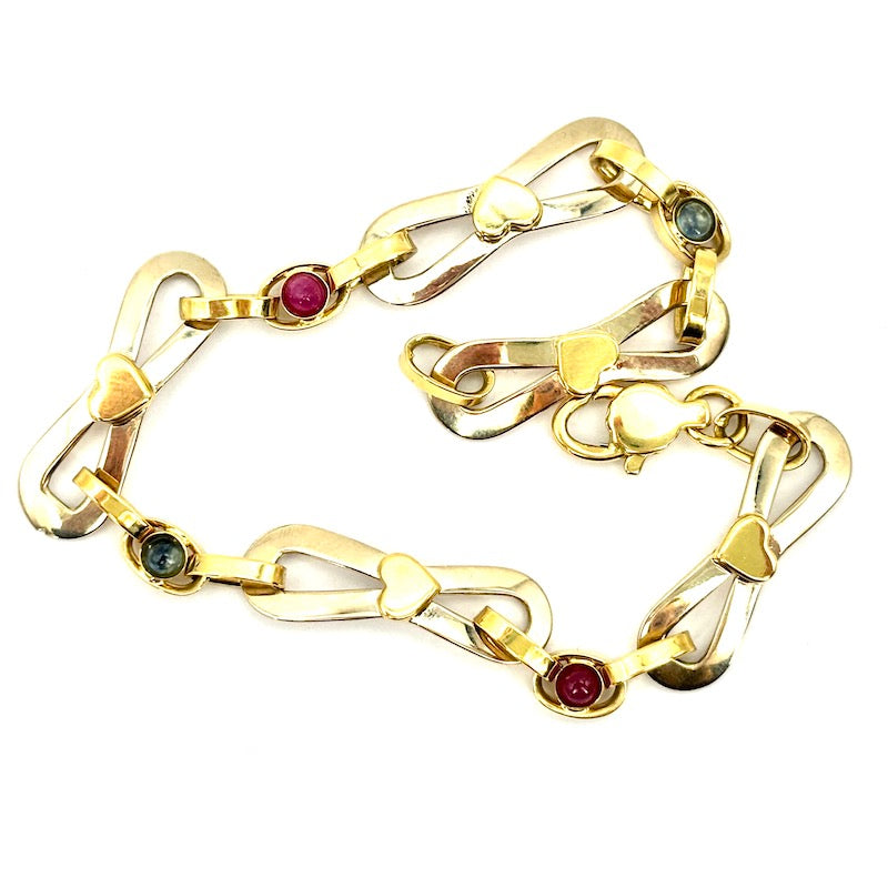 Bracciale catena fiocchi oro bicolore, zaffiri e rubini; 4.12 gr - 19.5 cm