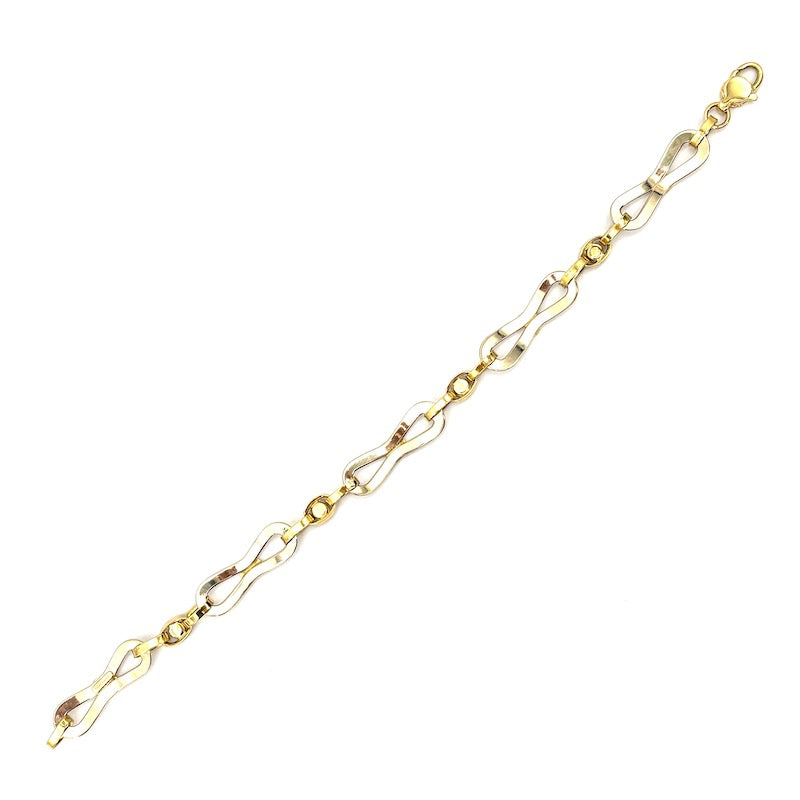 Bracciale catena fiocchi oro bicolore, zaffiri e rubini; 4.12 gr - 19.5 cm