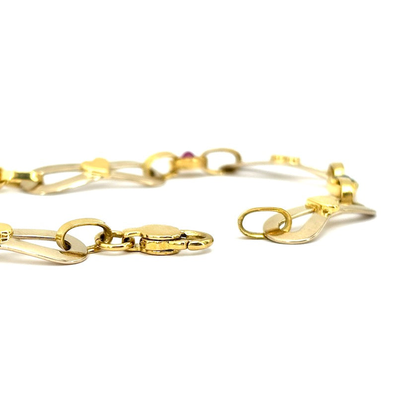 Bracciale catena fiocchi oro bicolore, zaffiri e rubini; 4.12 gr - 19.5 cm