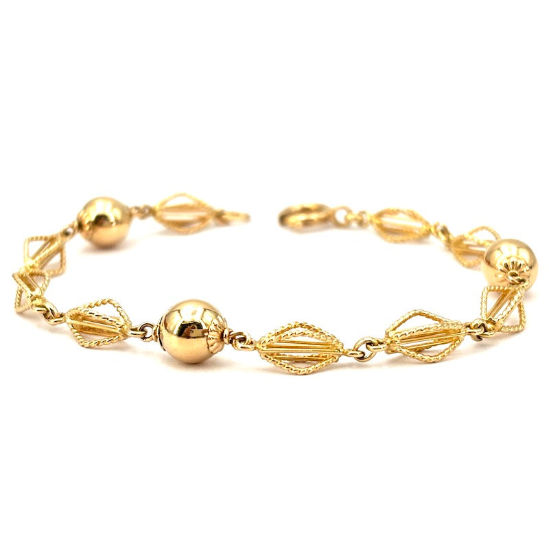 Bracciale catena palline e motivo corde oro; 6.65 gr - 17 cm