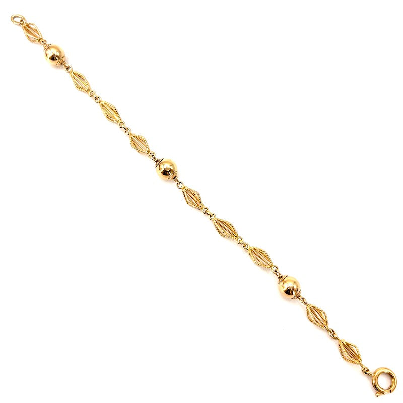 Bracciale catena palline e motivo corde oro; 6.65 gr - 17 cm