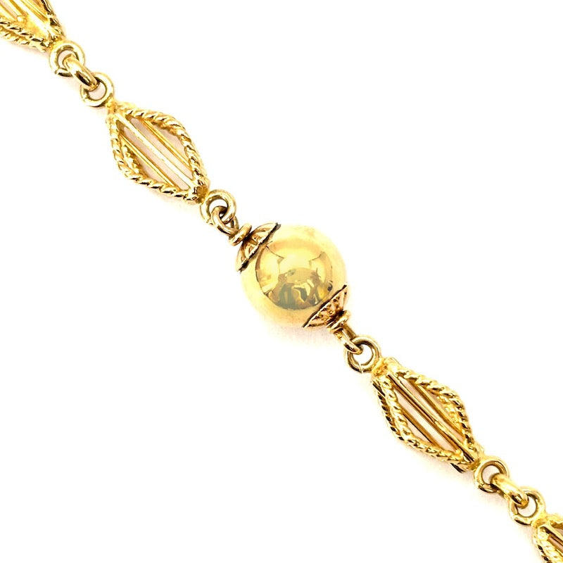 Bracciale catena palline e motivo corde oro; 6.65 gr - 17 cm