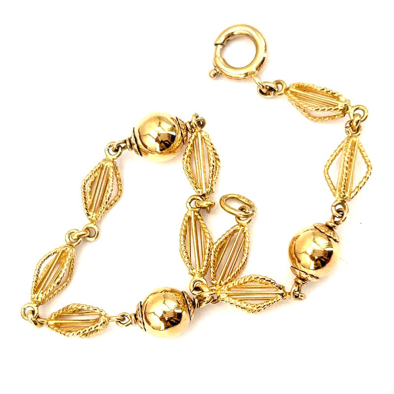 Bracciale catena palline e motivo corde oro; 6.65 gr - 17 cm