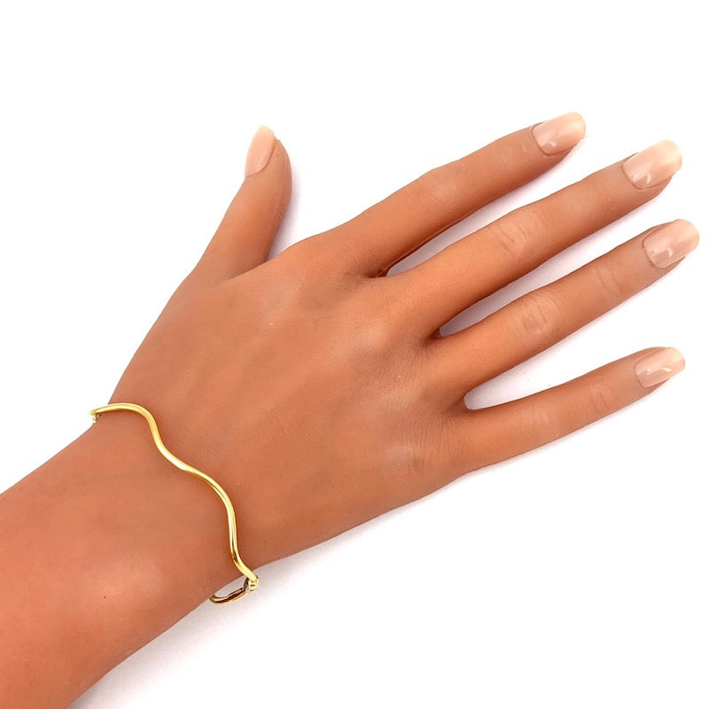 Bracciale cerchio rigido ondulato, oro giallo; 3.35 gr