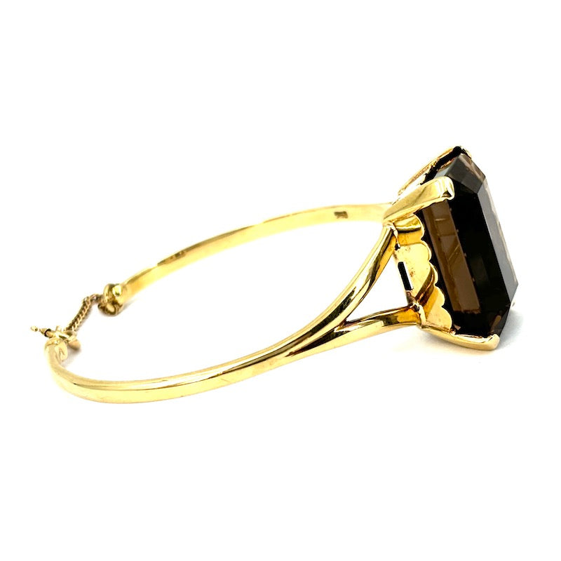 Bracciale cerchio rigido oro giallo, maxi quarzo fumè; 26.36 gr