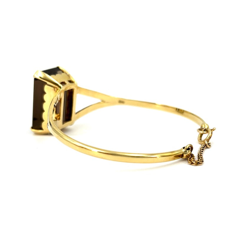 Bracciale cerchio rigido oro giallo, maxi quarzo fumè; 26.36 gr