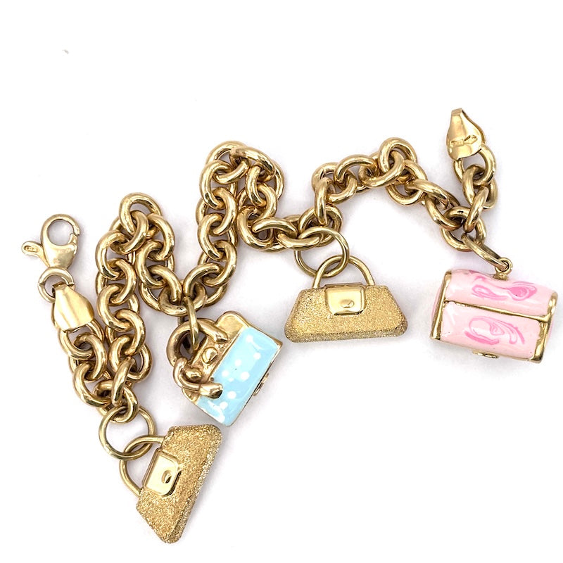 Bracciale charms borsette, oro 18 kt; 19.3 gr