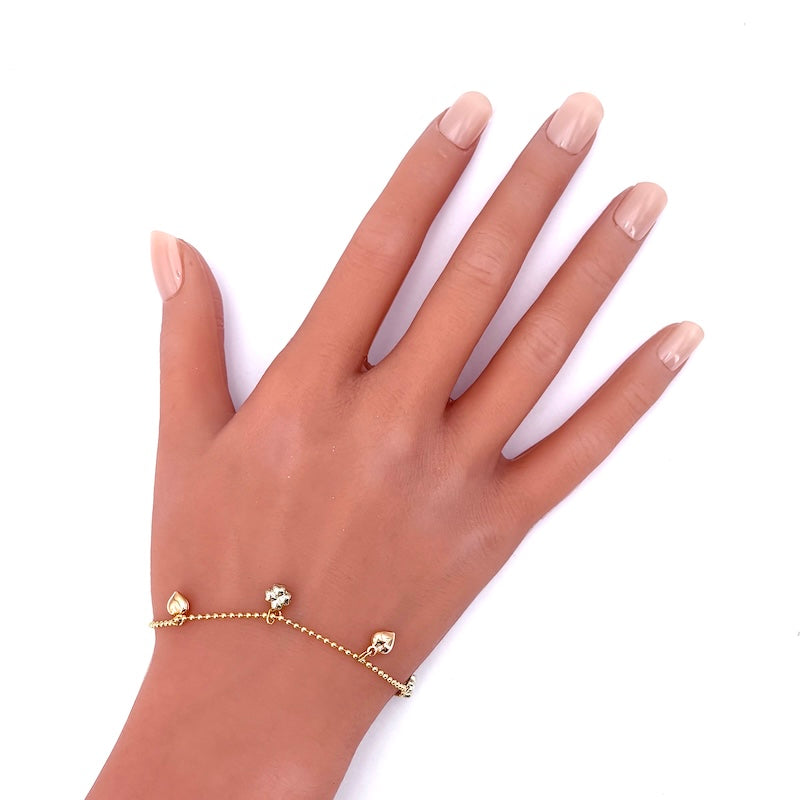 Bracciale charms cuori e quadrufogli, oro tricolore; 4.55 gr - 18 cm