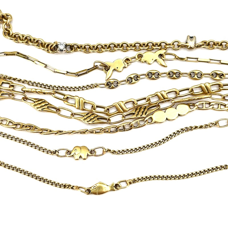 Bracciale mille fili, 8 catene varie, in oro giallo; 18 cm - 21.61 gr