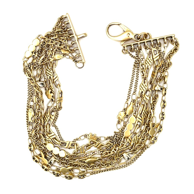 Bracciale mille fili, 8 catene varie, in oro giallo; 18 cm - 21.61 gr