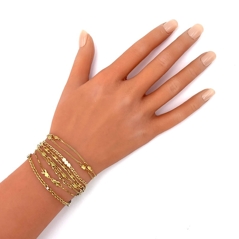 Bracciale mille fili, 8 catene varie, in oro giallo; 18 cm - 21.61 gr