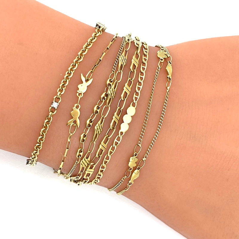 Bracciale mille fili, 8 catene varie, in oro giallo; 18 cm - 21.61 gr