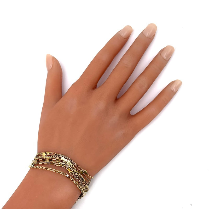 Bracciale mille fili, 8 catene varie, in oro giallo; 18 cm - 21.61 gr