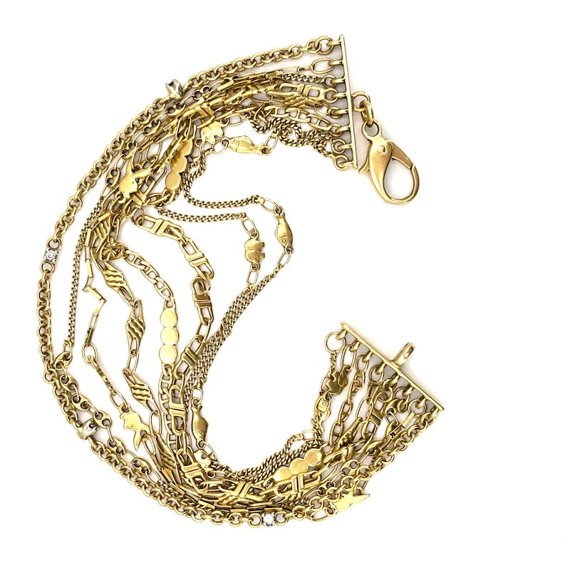 Bracciale mille fili, 8 catene varie, in oro giallo; 18 cm - 21.61 gr