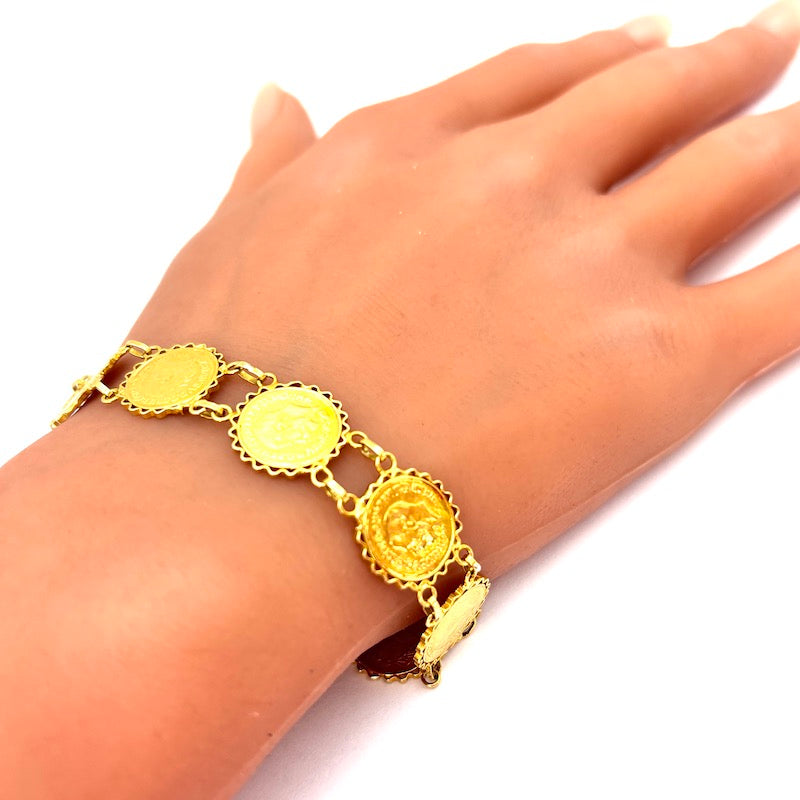 Bracciale monete riprodotte, oro giallo 18 kt; 11.05 gr - 19.5 cm