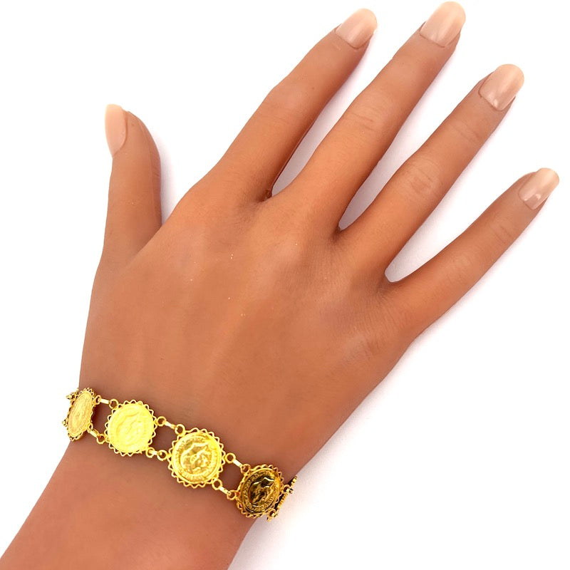 Bracciale monete riprodotte, oro giallo 18 kt; 11.05 gr - 19.5 cm