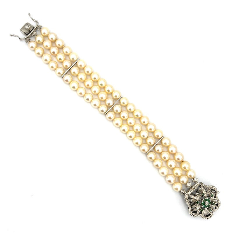 Bracciale perle 3 fili con chiusura fiore vintage smeraldi e oro; 18.5 cm - 41.26 gr