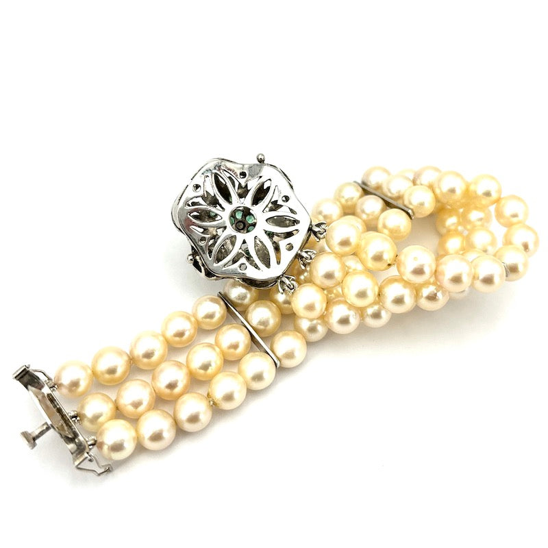 Bracciale perle 3 fili con chiusura fiore vintage smeraldi e oro; 18.5 cm - 41.26 gr