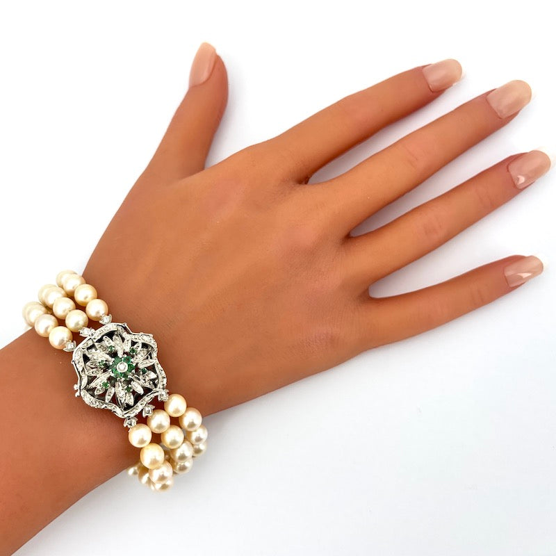 Bracciale perle 3 fili con chiusura fiore vintage smeraldi e oro; 18.5 cm - 41.26 gr