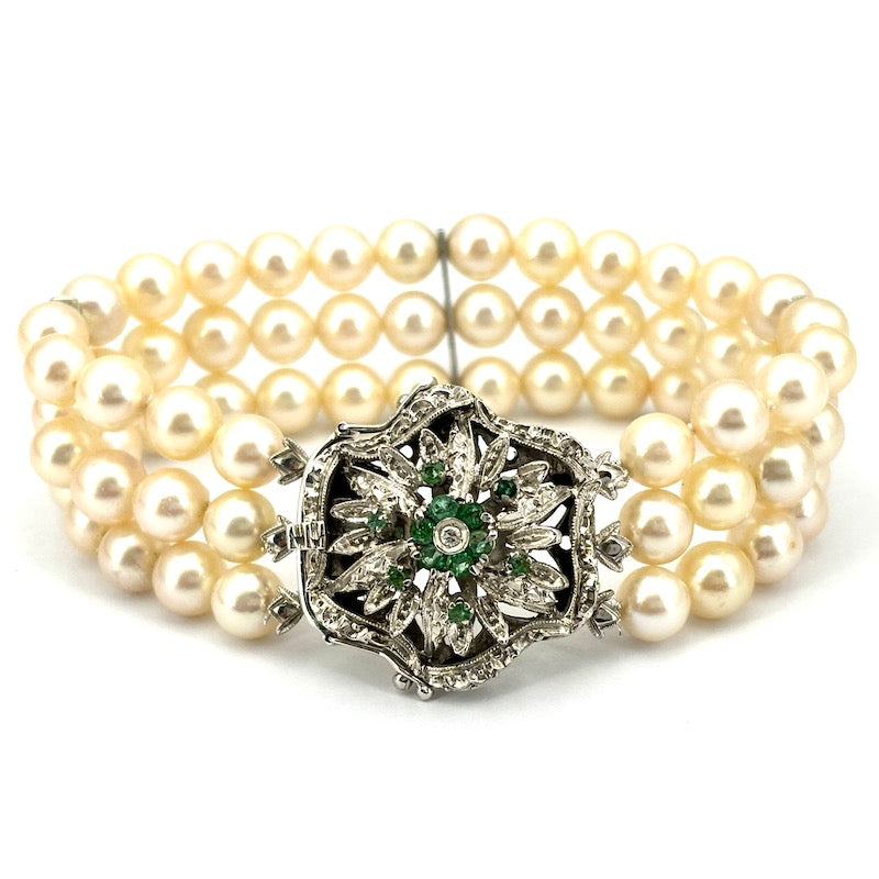 Bracciale perle 3 fili con chiusura fiore vintage smeraldi e oro; 18.5 cm - 41.26 gr