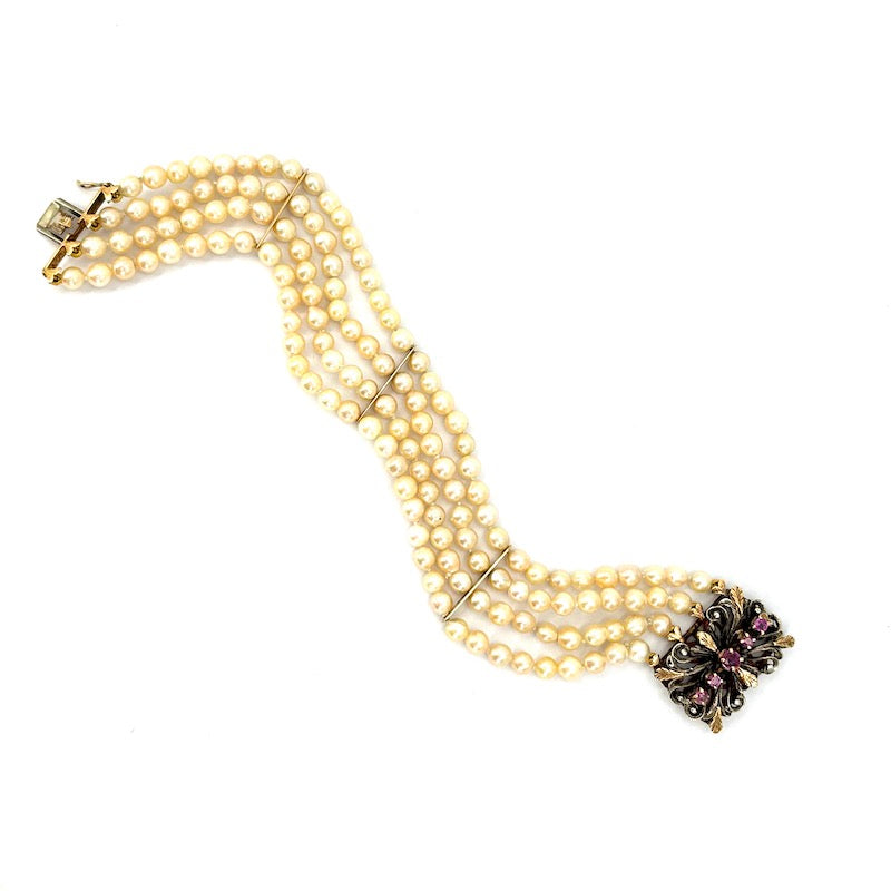 Bracciale perle a 4 fili con chiusura vintage rubini, oro e argento; 19.5 cm - 30.01 gr