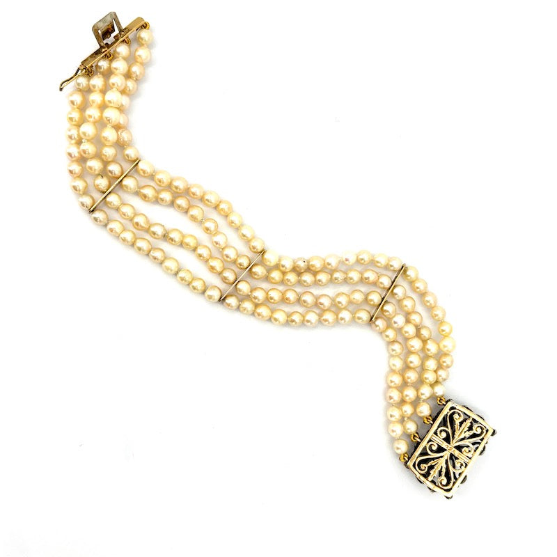 Bracciale perle a 4 fili con chiusura vintage rubini, oro e argento; 19.5 cm - 30.01 gr