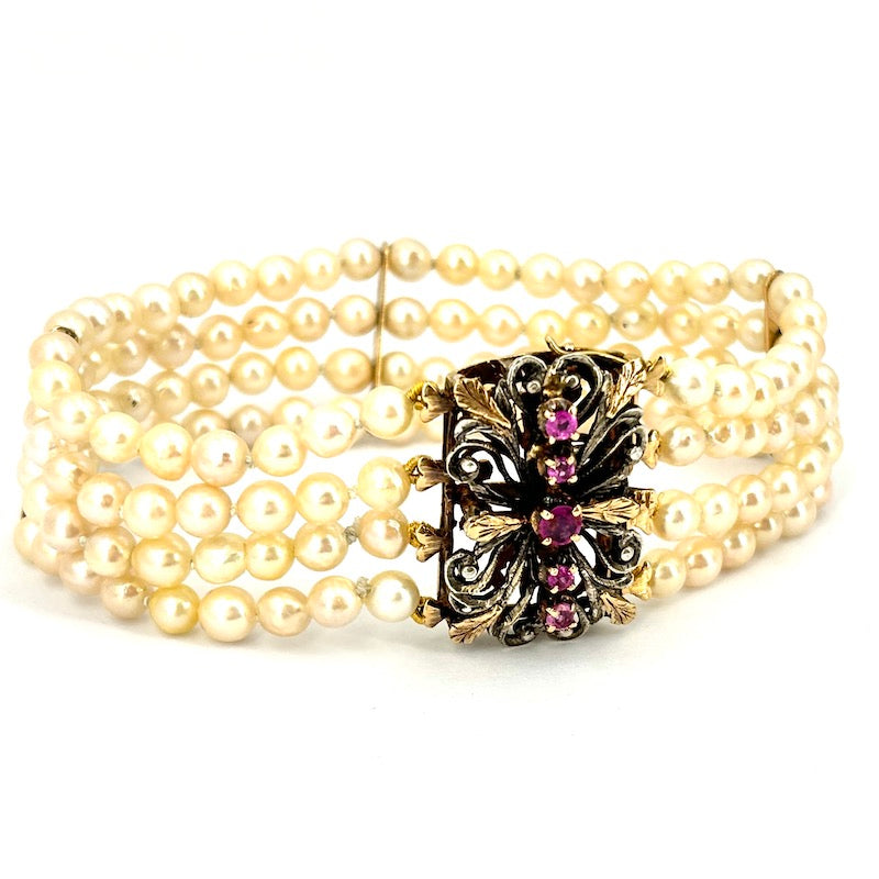 Bracciale perle a 4 fili con chiusura vintage rubini, oro e argento; 19.5 cm - 30.01 gr