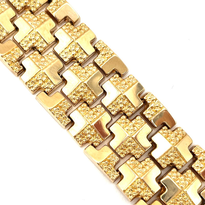 Bracciale polsino Unoaerre anni '60 croci oro giallo; 45.59 gr