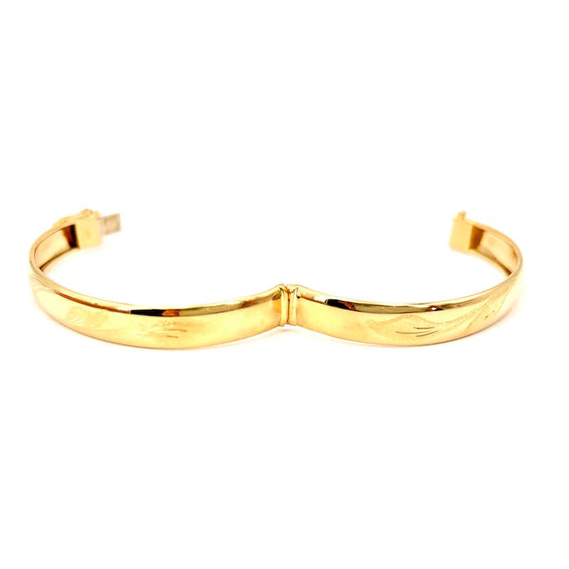 Bracciale rigido oro giallo inciso; 12.9 gr