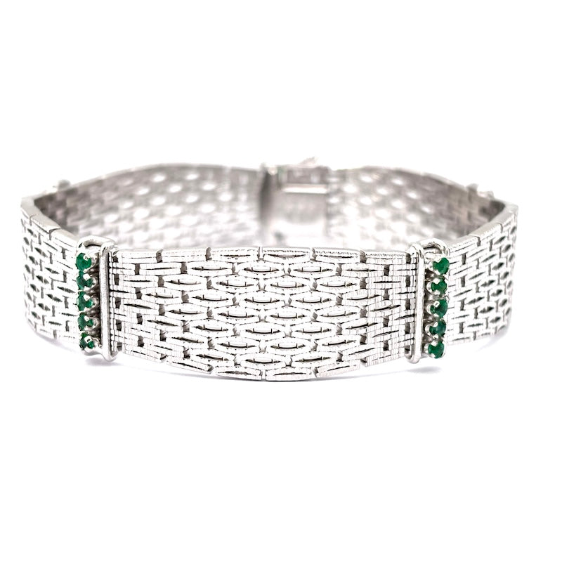Bracciale semirigido, oro bianco e smeraldi; 49.66 gr