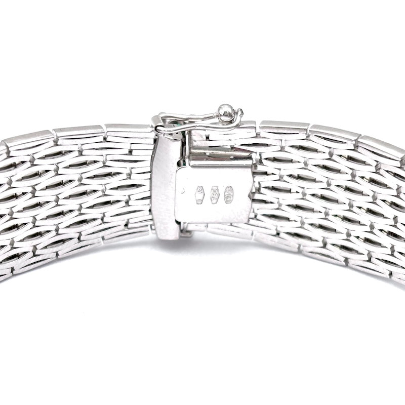 Bracciale semirigido, oro bianco e smeraldi; 49.66 gr