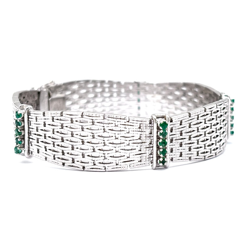 Bracciale semirigido, oro bianco e smeraldi; 49.66 gr