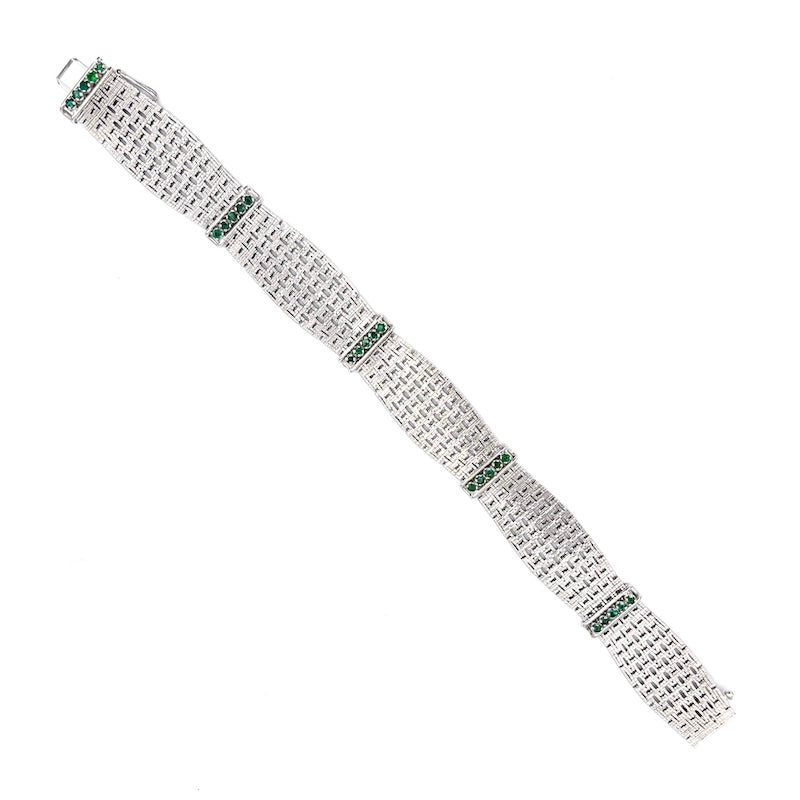 Bracciale semirigido, oro bianco e smeraldi; 49.66 gr