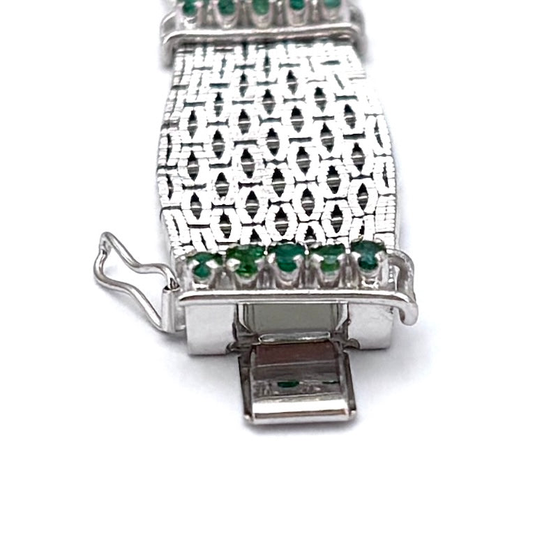 Bracciale semirigido, oro bianco e smeraldi; 49.66 gr