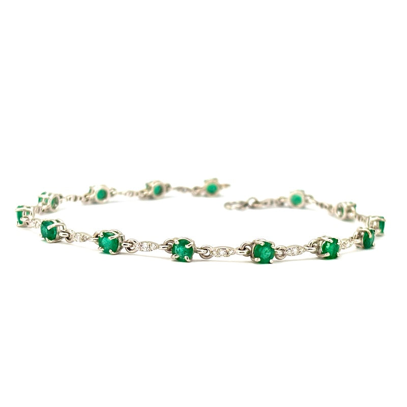 Bracciale smeraldi - 2.89 ct - brillanti - 0.56 ct - e oro; 5.67 gr