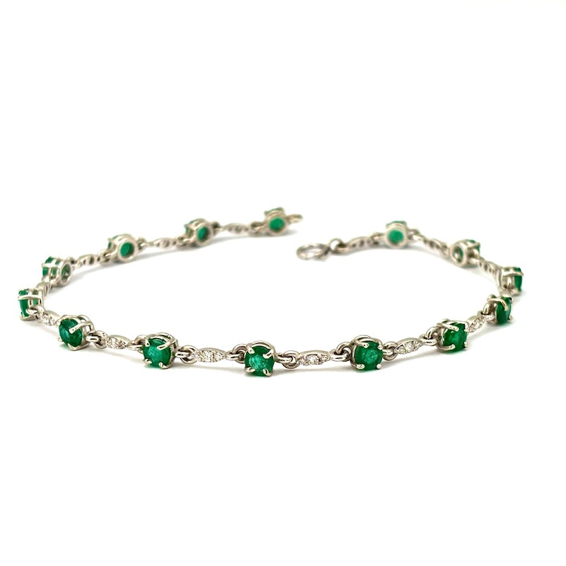 Bracciale smeraldi - 2.89 ct - brillanti - 0.56 ct - e oro; 5.67 gr